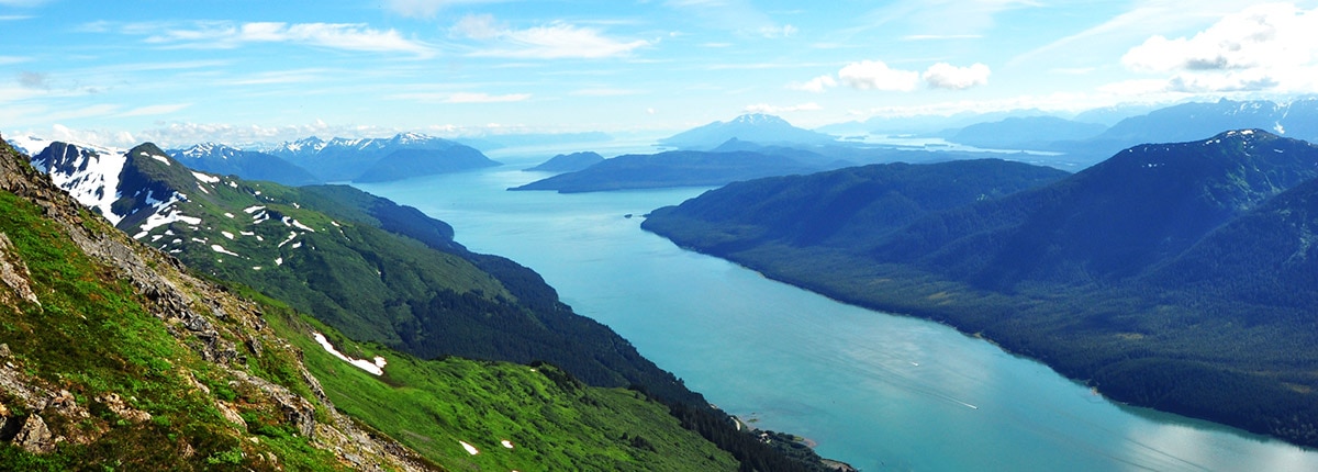 mountain top view of a scenic alaskan river