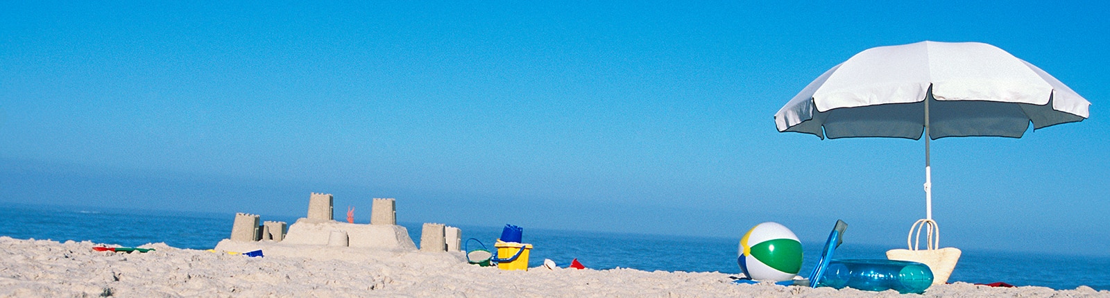 Sand castles on beautiful white sand in Freeport, Bahamas