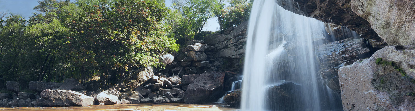 Gorgeous waterfall amongst rich vegetation in Nassau, Bahamas