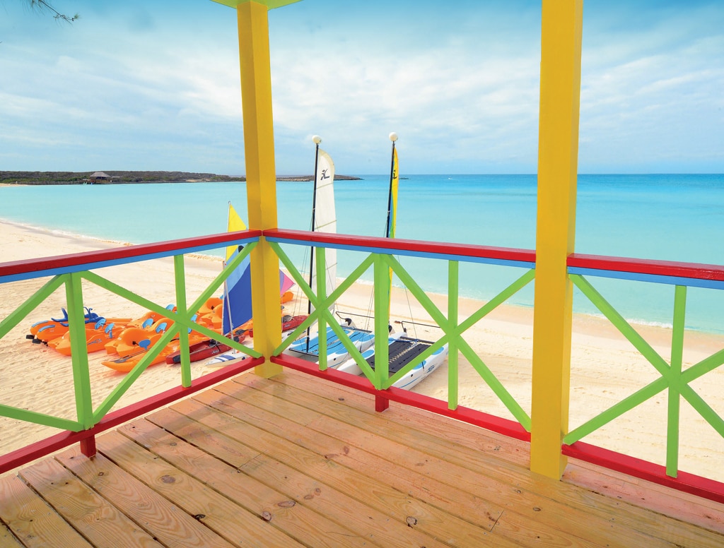 view of the crystal blue ocean from a villa on half moon cay