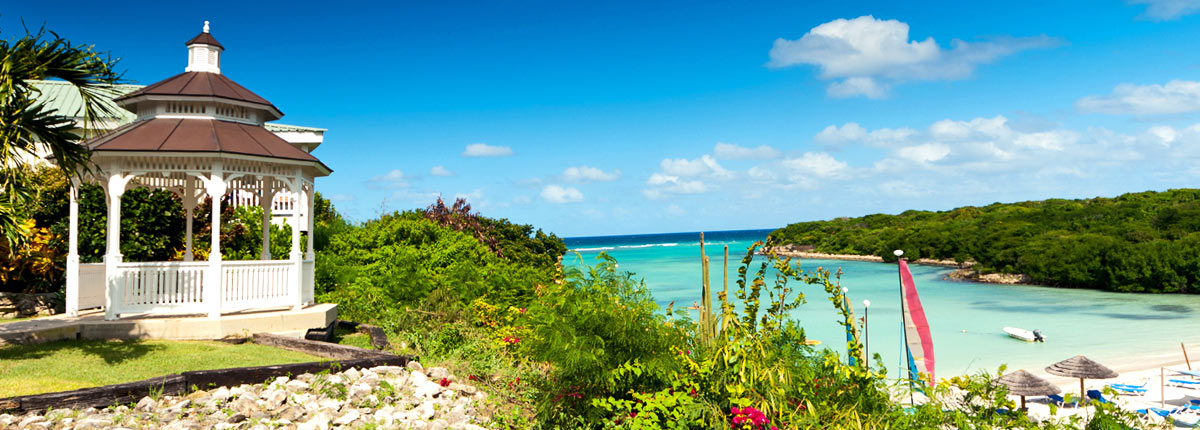 gazebo overlooking clear water in antigua