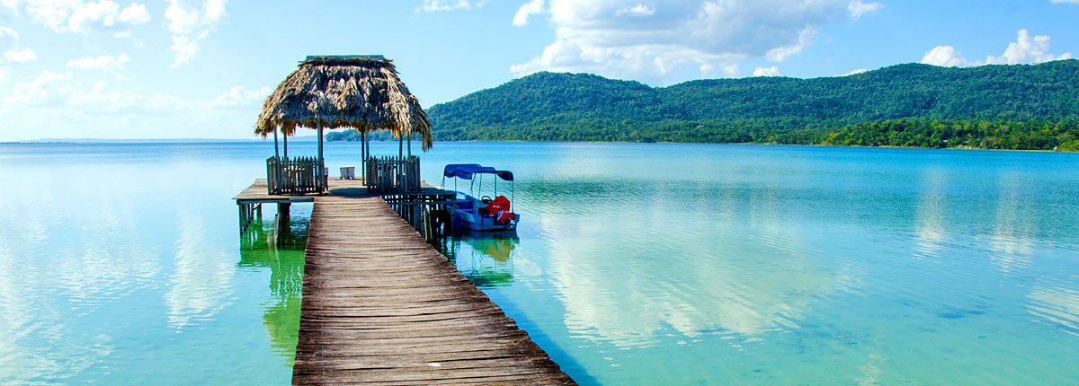 views of the ocean and mountains from dock in belize