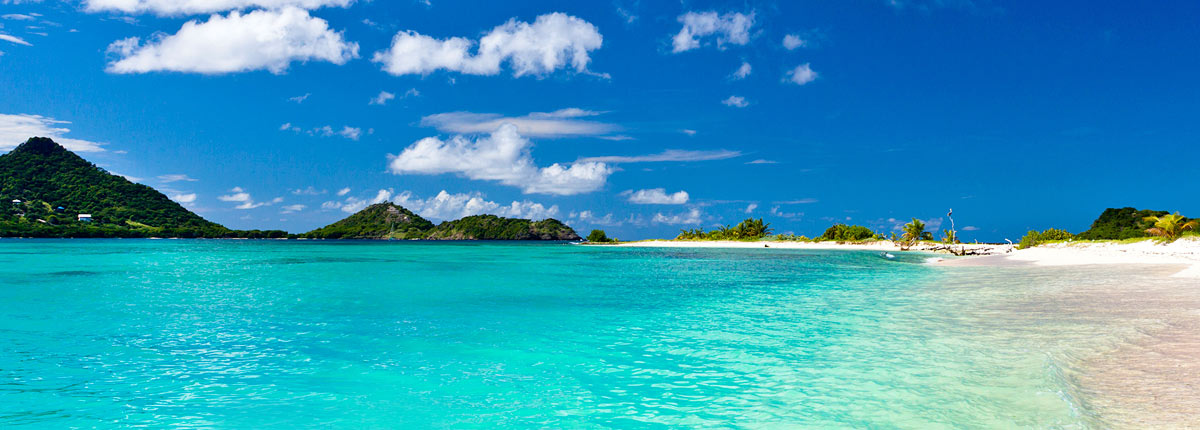 float in the crystal clear blue water of grenada