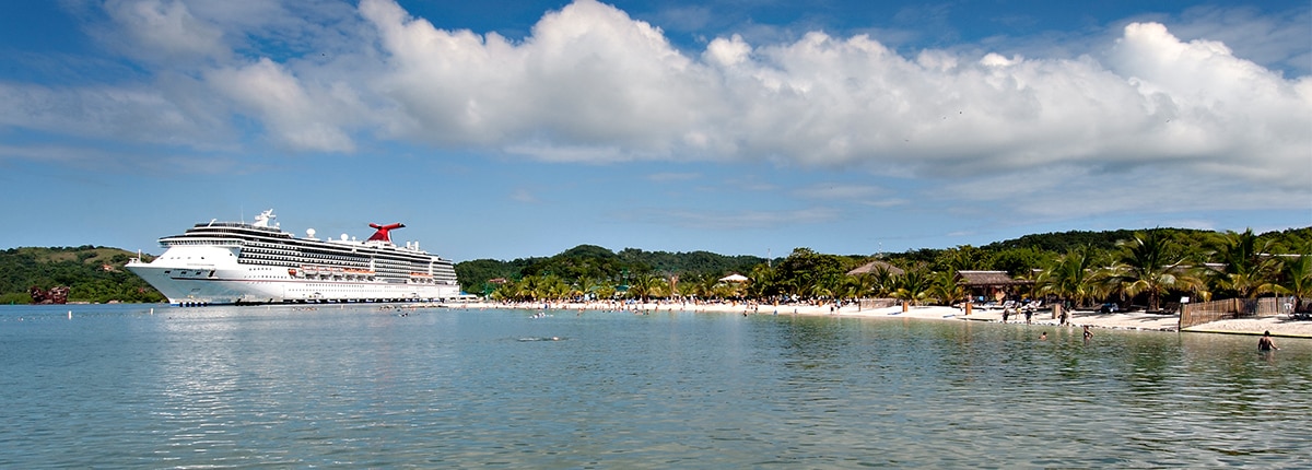 a carnival ship along the mahogany bay shore