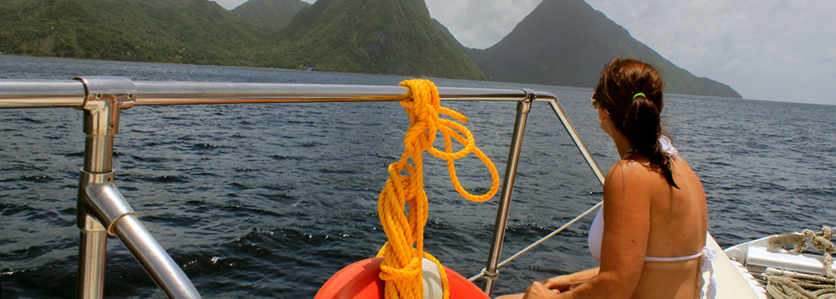 young woman takes a catamaran ride