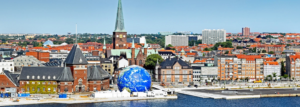 a giant globe of earth is located in the city of aarhus