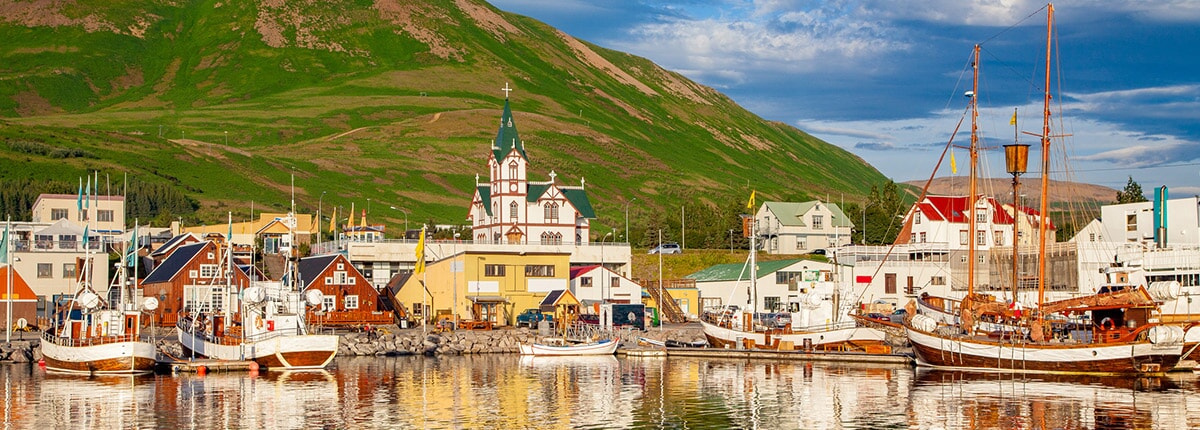 view of boats at the pier in akureyri, iceland