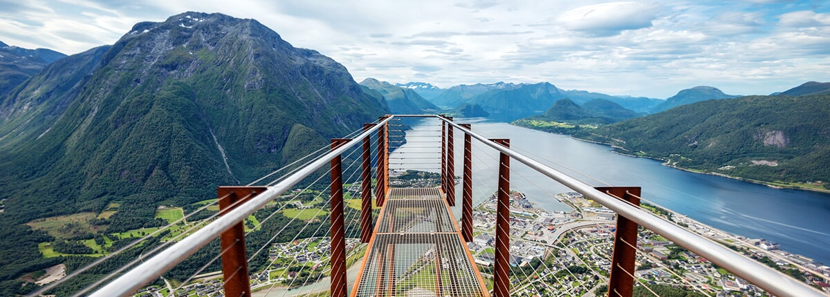 view of rampestreken and surrounding mountains in andalsnes, norway