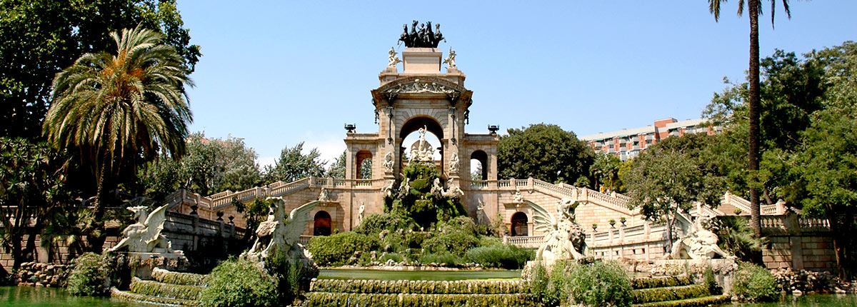 take photos next to beautiful fountains in barcelona