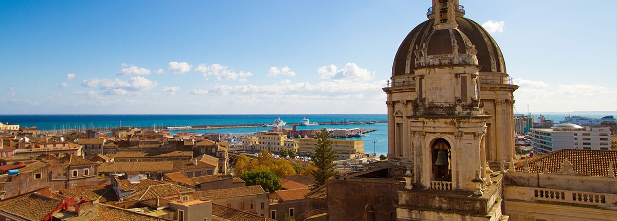 cathedral cupola and the catania city town in catania, sicily