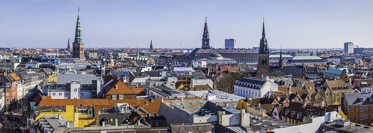 aerial view of copenhagen's canal, churches, and palaces