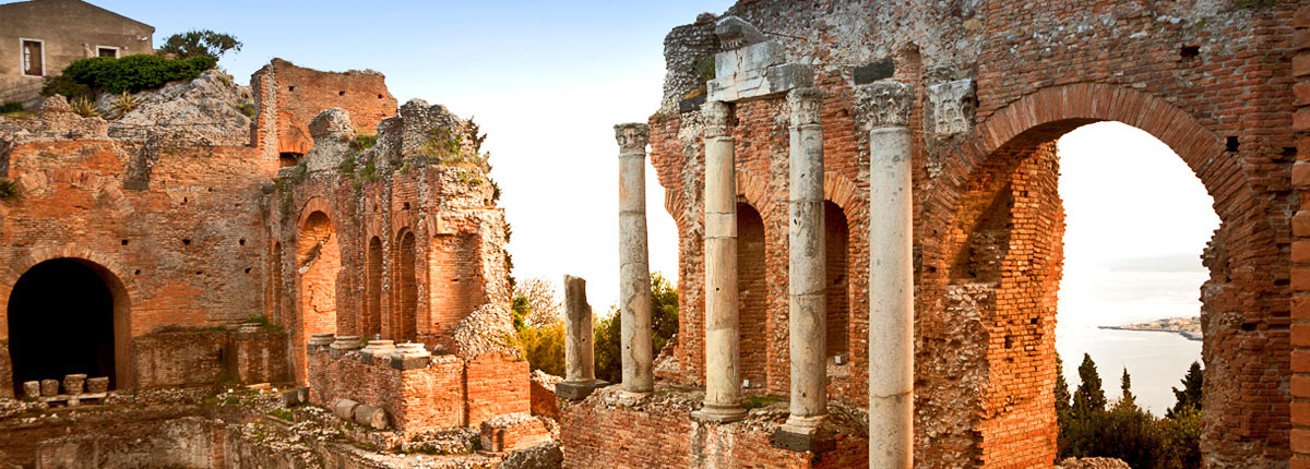 visit the ancient greek taormina theatre in siciliy