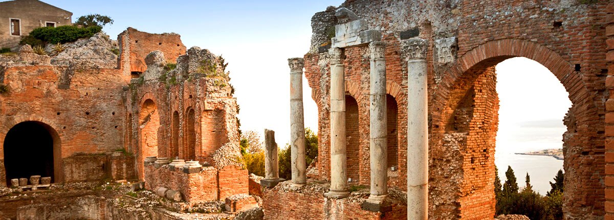 visit the ancient greek taormina theatre in siciliy