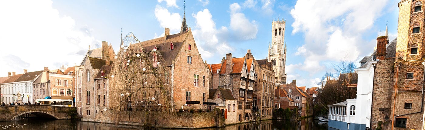 medieval houses and gothic bell tower in brussels 