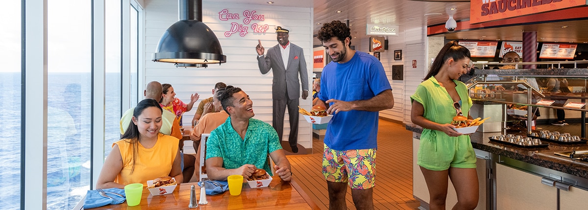 four guests gather together to eat chicken sandwiches at big big chicken