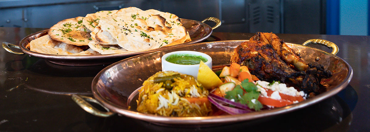 Food platters at Masala Tiger, Carnival Splendor.