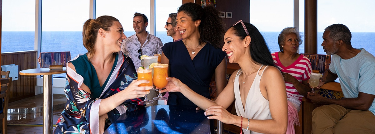 guests saying cheers at the blue iguana tequila bar