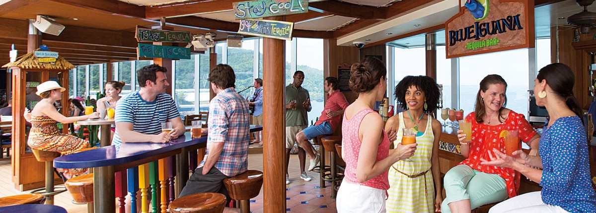 people enjoying fresh cocktails at blueIguana tequila bar