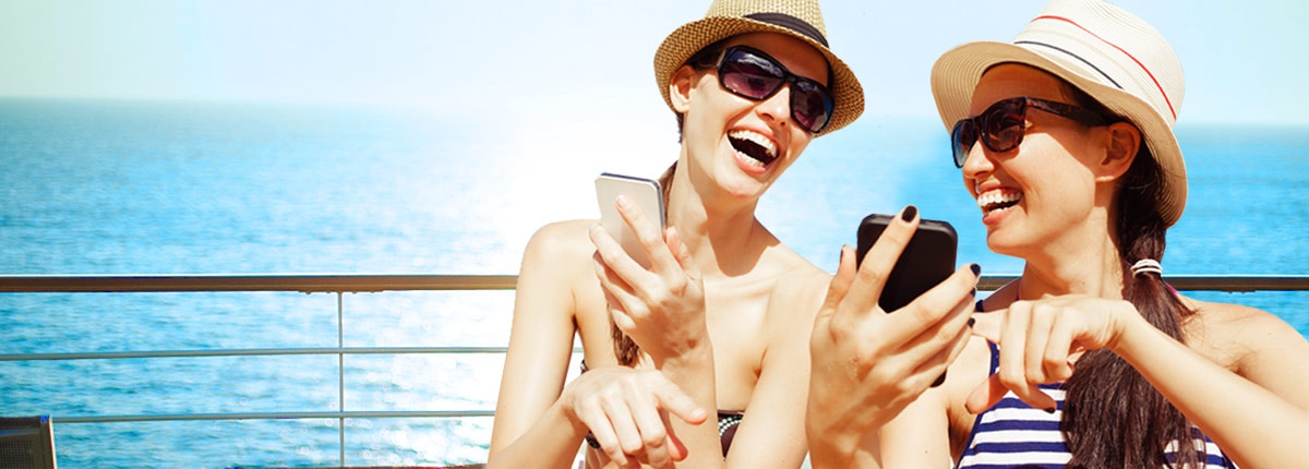 women browsing the web on their mobile devices