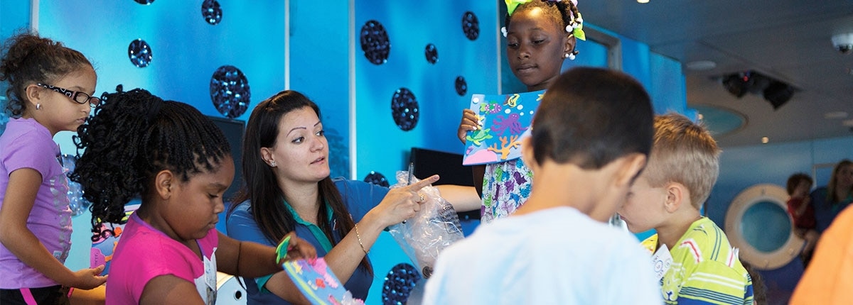 camp ocean guests engaging in arts and crafts