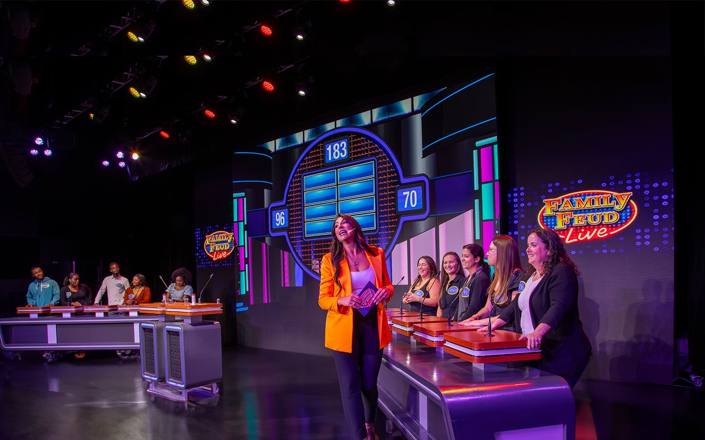 View of the Family Feud Live host on stage onboard mardi gras